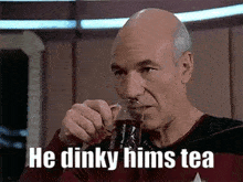 a bald man is drinking a cup of tea with the words `` he dinky hims tea '' .