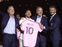 posing with the jersey lionel messi david beckham inter miami cf major league soccer
