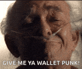 an elderly man with an oxygen tube in his nose is asking for a wallet punk