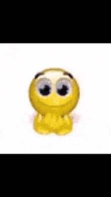 a pixel art of a pink heart shaped smiley face