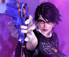 a woman holding a gun that says ribbon ultra