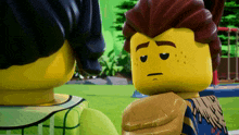 a lego figure with a sad look on his face stands next to another figure