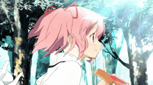 a girl with pink hair is holding a piece of bread