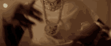 a close up of a person 's arm with a bracelet on
