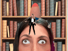 a woman 's head with a rocket on top of it and a book shelf in the background