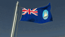 a british flag with a sailboat in the middle
