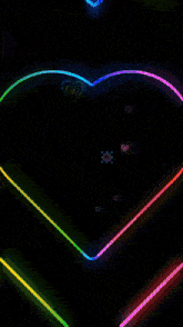 a man and a woman are surrounded by neon hearts and the word love