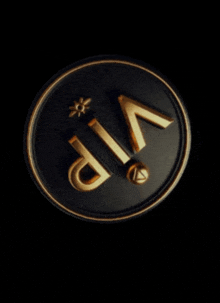 a black and gold coin with the word vip in gold letters