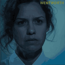 a close up of a woman 's face with the word no written on it