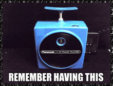 a blue panasonic track player with the number 1 on it
