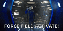 a man standing in a room with the words force field activate on the bottom