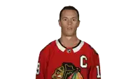 a hockey player wearing a jersey that says omg on it
