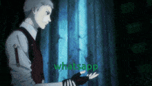 a man in a suit is standing in front of a window and the word whatsapp is visible