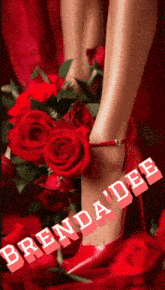 a picture of a woman 's feet with red roses and the name brenda dee