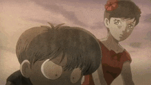 a girl with a flower in her hair is standing next to a boy with glasses