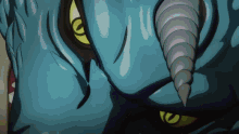 a close up of a monster 's face with yellow eyes