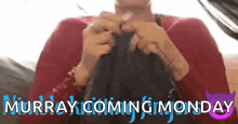 a woman in a red sweater is knitting with the words murray coming monday in the background