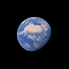 a view of the earth from space with a cloud in the middle of it .