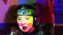 a woman wearing a headband with a leaf on it