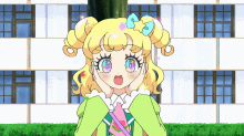 a girl with blonde hair and a blue bow on her head