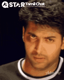 a star tamil chat ad with a man 's face on it