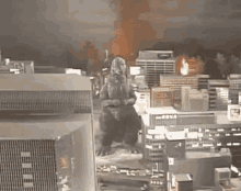 a monster is standing in the middle of a city .