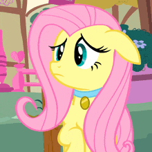 a cartoon pony with pink hair and blue eyes looks sad