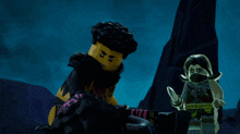 two lego figures are standing next to each other and one has a knife in his hand