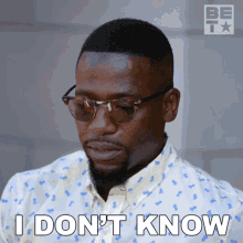 a man wearing glasses says i don t know