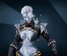 a statue of a woman in a black and gold outfit is standing in front of a blue background