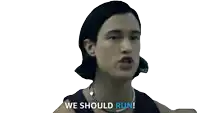a man wearing a pearl necklace and a purple tank top says we should run