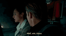 a man and woman are sitting in a car and the man is saying well shit diana