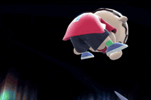 a cartoon character in a red shirt is jumping in the air with his eyes closed