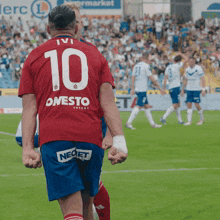 a soccer player with the number 10 on the back of his shirt