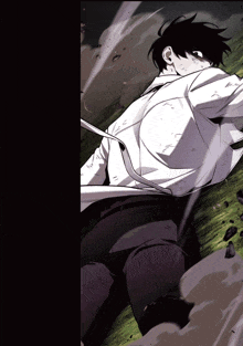 a man in a white shirt and black pants is laying down