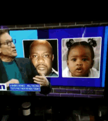 a tv screen shows a man and a little girl and says 6 babies denied