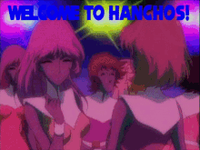 a group of girls are standing in front of a welcome to hanchos sign