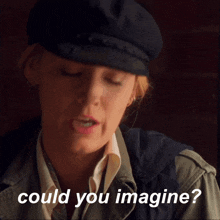 a woman wearing a hat with the words could you imagine next to her