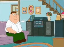 peter griffin from family guy is sitting on a couch