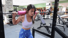 weak girl gym struggling work out heavy