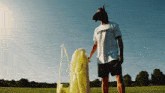 a man wearing a horse head mask and a shirt that says cyrric
