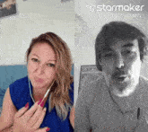a woman wearing headphones next to a man with a beard and a starmaker id