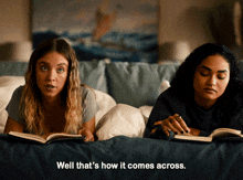 two women laying on a bed with one saying well that 's how it comes across ..