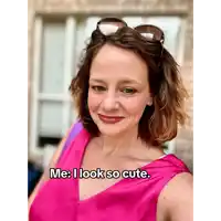 a woman wearing sunglasses and a pink top says " me i look so cute "