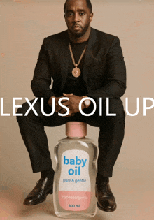 a man in a suit is sitting on a bottle of baby oil