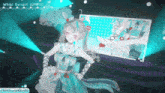 a girl in a blue dress is dancing on a stage in front of a screen .