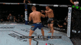 two men are fighting in a boxing ring with espn and crypto.com advertisements