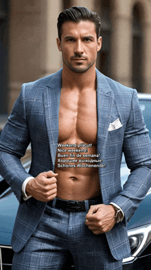 a shirtless man in a suit stands in front of a blue car