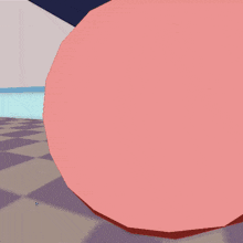 a pink ball is sitting on a checkerboard floor