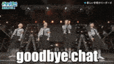 a group of girls singing on stage with the words goodbye chat
